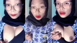 Gadis SMA Berhijab Menggairahkan Meremas Payudaranya