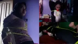 Ukhti pasrah, hijab diikat erat, tubuh dimainkan penuh nafsu BDSM.
